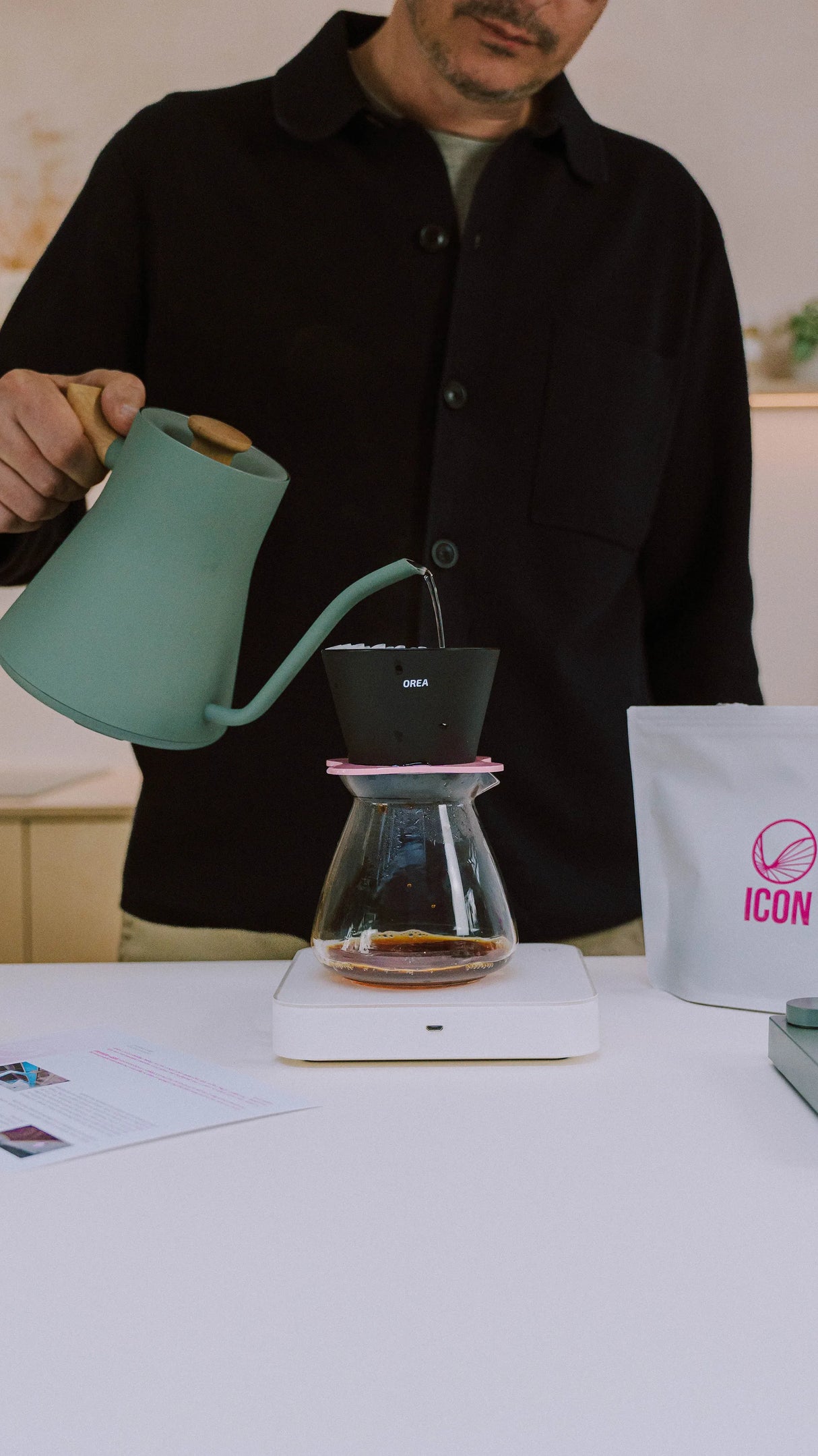 Pouring an OREA coffee dripper with ICOn subscription coffee