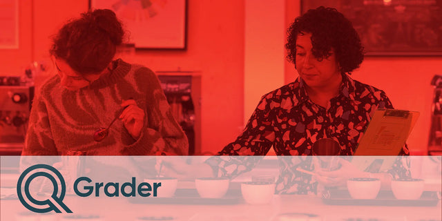 Two women working together in an office setting with a red overlay, featuring the Grader logo.